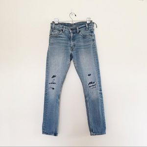 LEVI JEANS WITH VISIBLE MENDING